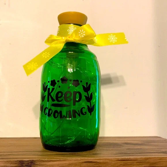 ‘Keep Growing’ green glass barrel solar lantern