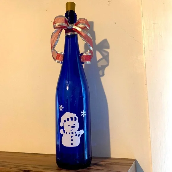 Snowman blue wine bottle lantern