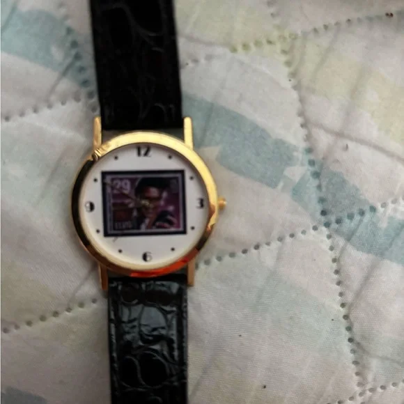 Gold and Black Wearable Watch face if Elvis Presley