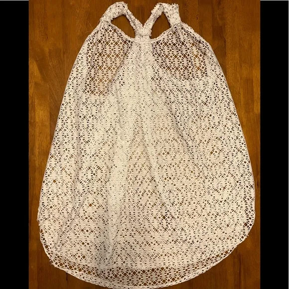 EUC swim coverup with adjustable straps and back. Excellent condition.