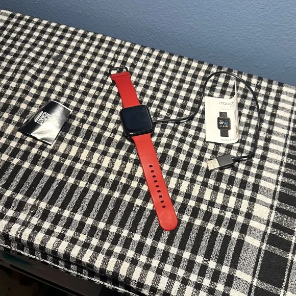 Smartwatch in Red itouch air 3 excellent condition.
