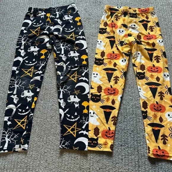 2 pairs of Girls size small Halloween Leggings