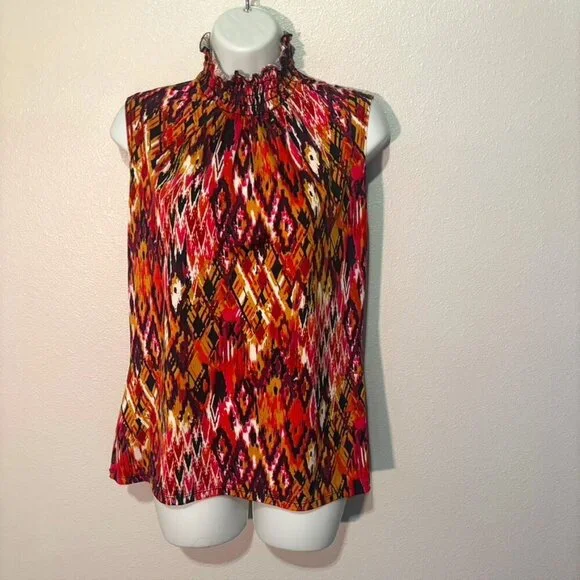 L Sere nade sleeveless multicolored turtlenecked blouse with diamond shapes