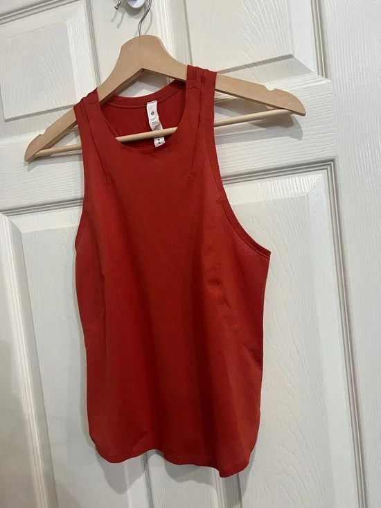 23. Lululemon size 2 fast and free running training tank burnt orange