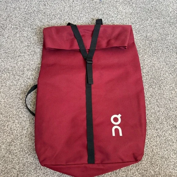On Running ambassador Roll Top Backpack Burgundy adjustable strap