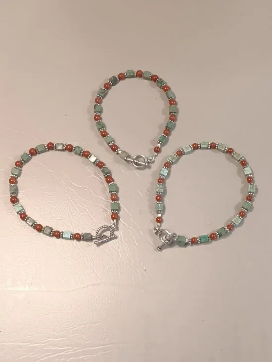 Lot of 3 stone bead bracelets green brown silver tones