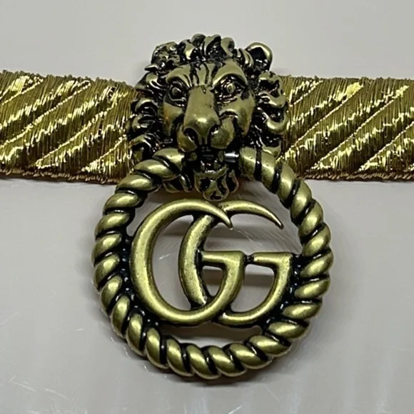 Gucci Gold Tone Lion Head GG Bracelet Charm