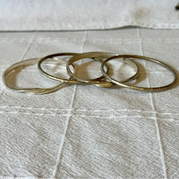 Set of 4 Silver Tone Bangle Bracelets to stack/layer