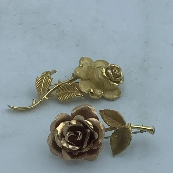 Two Goldtone Rose Brooches