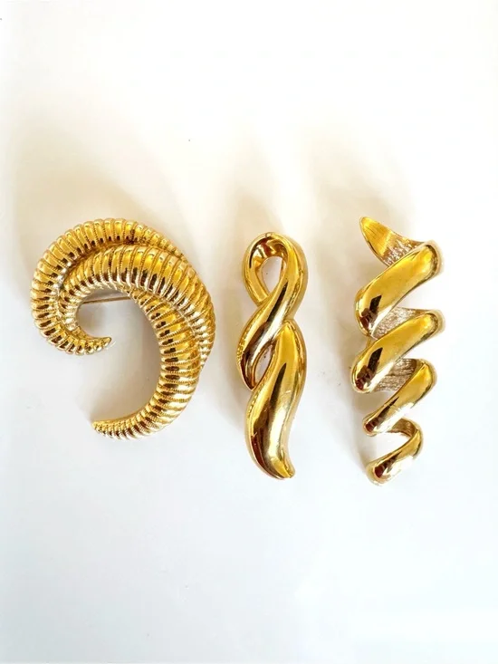 Monet Gold-Tone Spiral Brooch Trio - Sculptural Swirl Designs