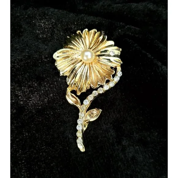 vintage gold tone floral design chrystal lined stem brooch