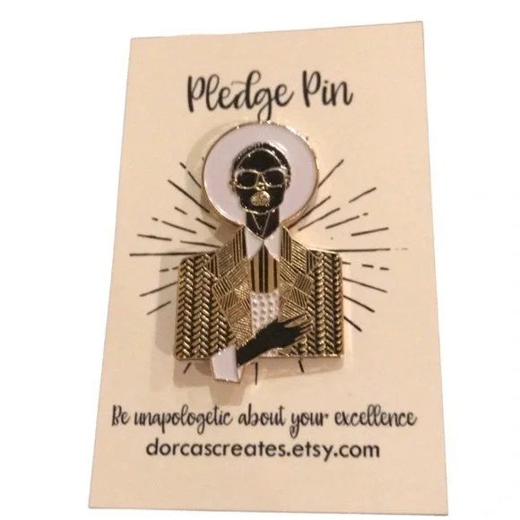 Gorgeous gold, black, and white pledge lapel pin.