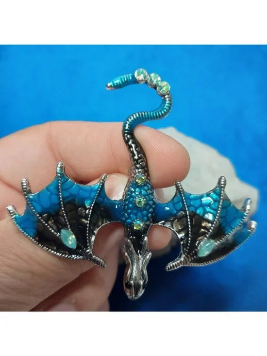 Beautiful blue dragon brooch pin.