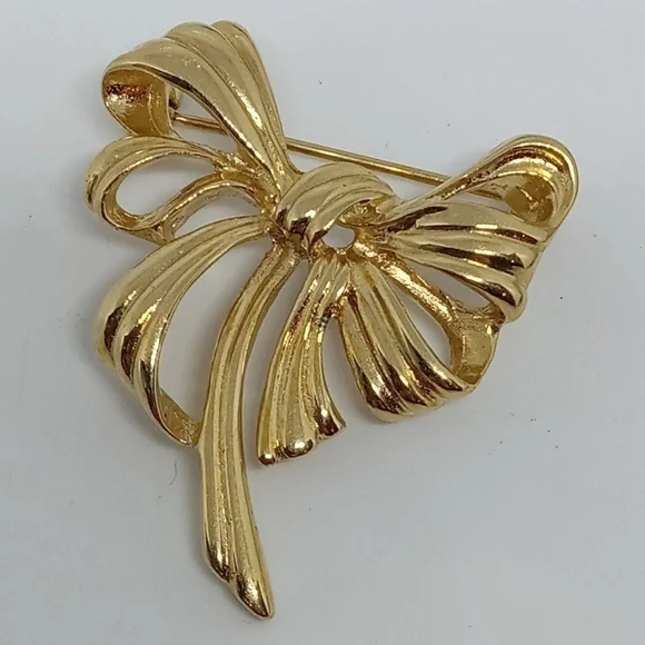 * vintage Givenchy gold tone ribbon bow pin brooch