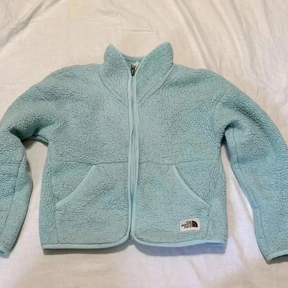The North Face girls light blue fleece full zip jacket size M 10-12