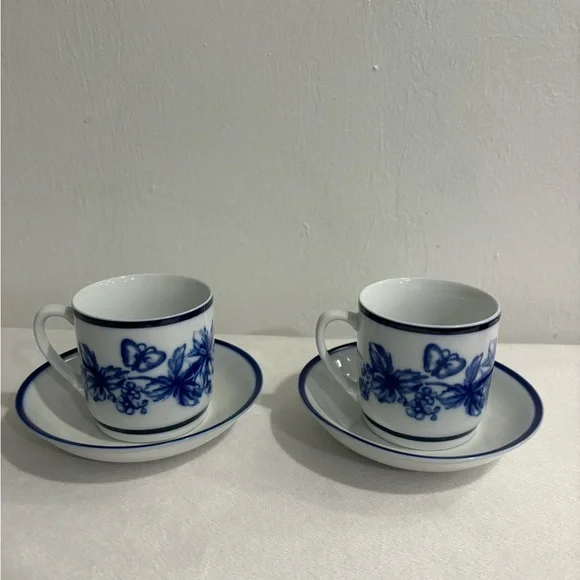 Williams Sonoma blue and white butterfly mugs and saucers