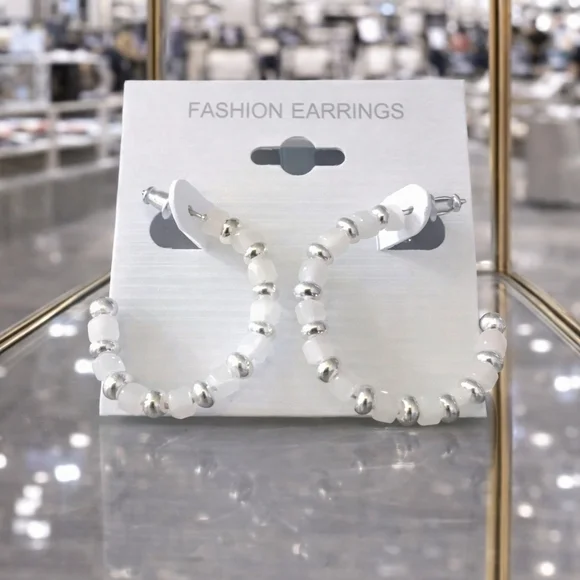 Silver and white beaded hoop earrings
