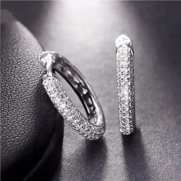 The Brilliance Mini Hoop Earrings in 925 and cubic zirconia