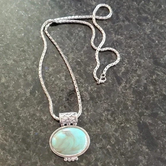 Green turquoise like slider stone with silver color long chain