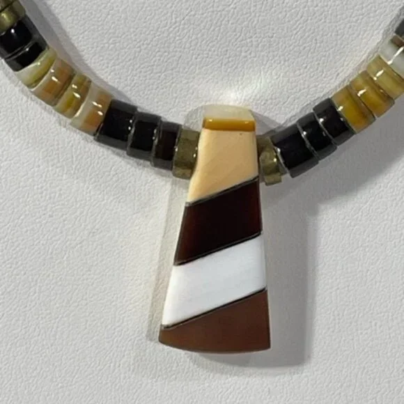 Vintage stone and inlay heishi necklace. Shell, onyx and jasper.