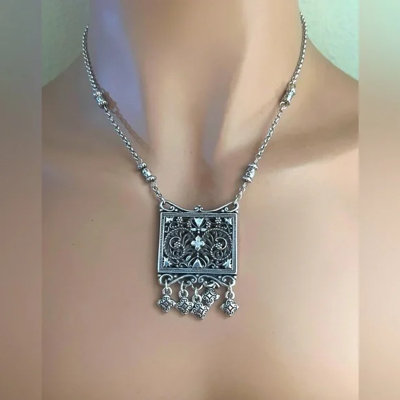 Brighton pendant necklace. Square pendant with loose charms. 10