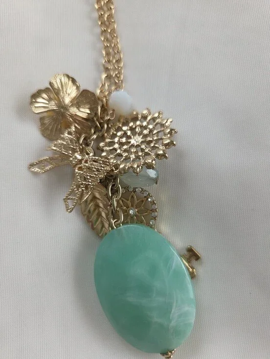 Gold Tone Charm Pendant Necklace with Turquoise Stone