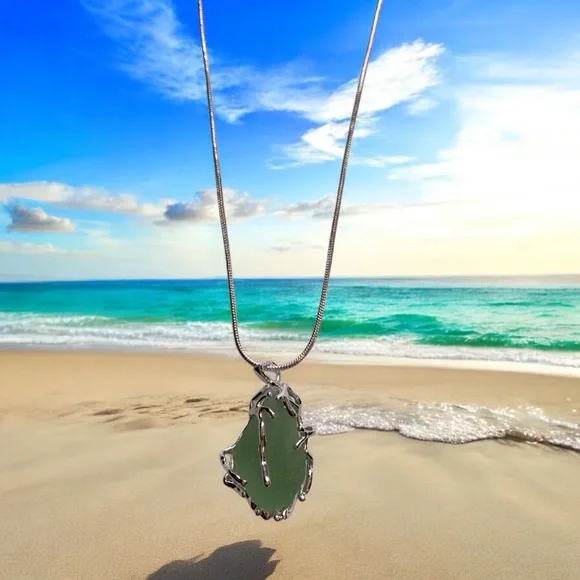 Genuine Caribbean Sea Glass Wrapped in Nature-Inspired Silver Plated Cage