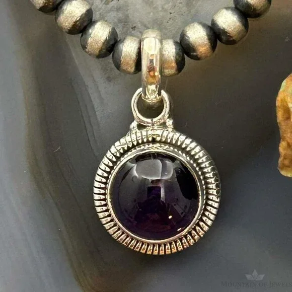 Sterling Southwestern Style Round Amethyst Decorated Charm/Pendant For Women