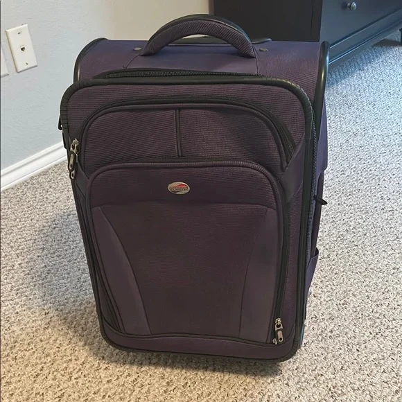 American Tourister Purple Carry-On Rolling Suitcase