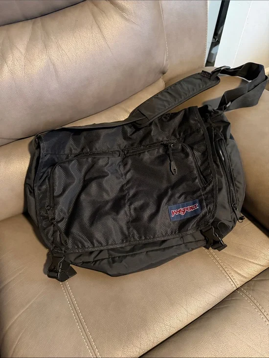 Jansport Black Men's Messenger Bag with Front Zipper Pocket