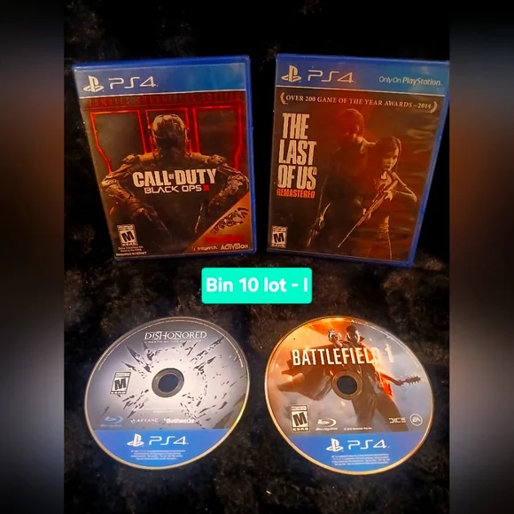 4 Disc Game Lot Sony PS4 Game Collection - Blue and Red Cases