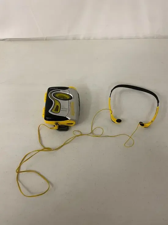 Vintage Sony Sports FM/AM Radio Cassette Walkman WM-FS111 w/ MDR-W014 Headphones