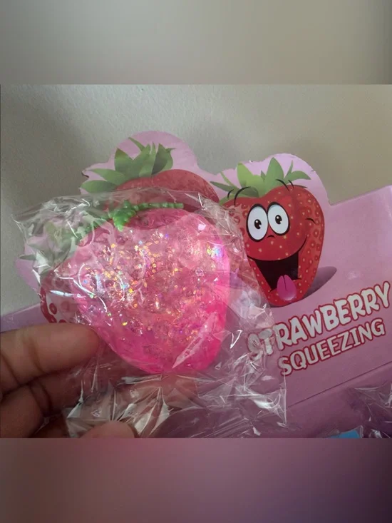 Strawberry Squeezing Stress Ball squishy - Pink Glitter
