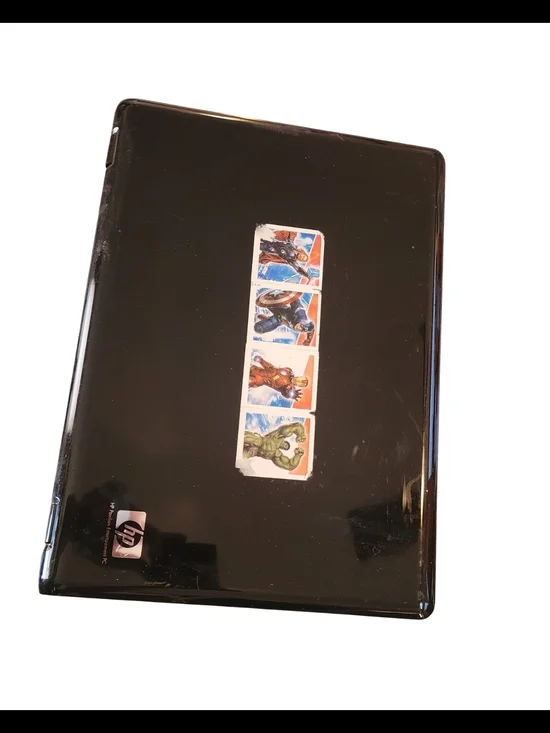 HP Pavilion dv6000 Black Laptop with Superhero Sticker Accent