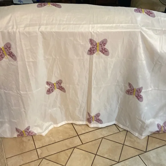 Polyester white with purple butterflies shower curtain.