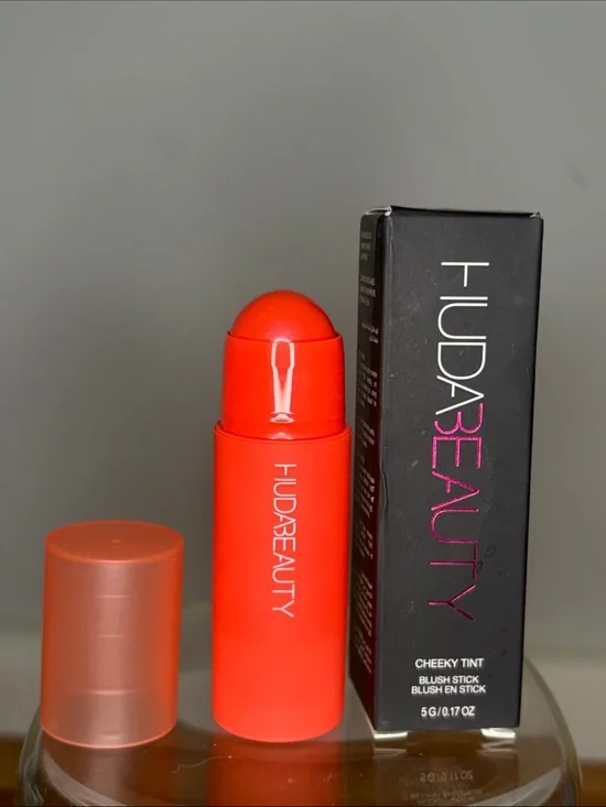 HUDA BEAUTY Cheeky Tint Blush Stick — coral cutie