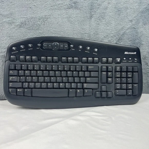Microsoft Wireless MultiMedia Keyboard 1.1 Model‎ 1014 WUR0445 (Keyboard Only)