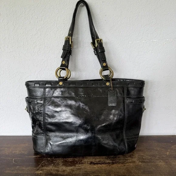 Coach Gallery Laced East West tote bag in black patent Leather Brass Hardware.