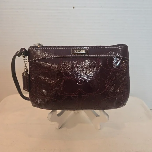 Coach Burgundy Patent Leather Logo Embossed Wristlet Clutch Bag