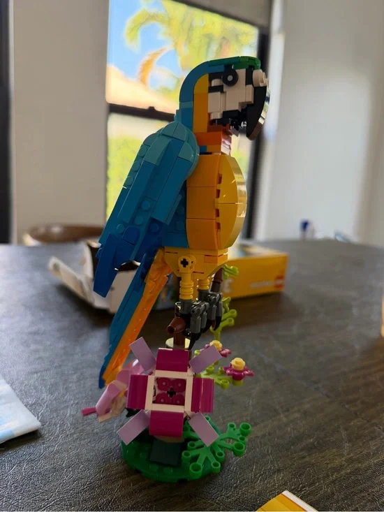 Blue and Yellow Parrot Bird Figurine - Decorative Pet Display