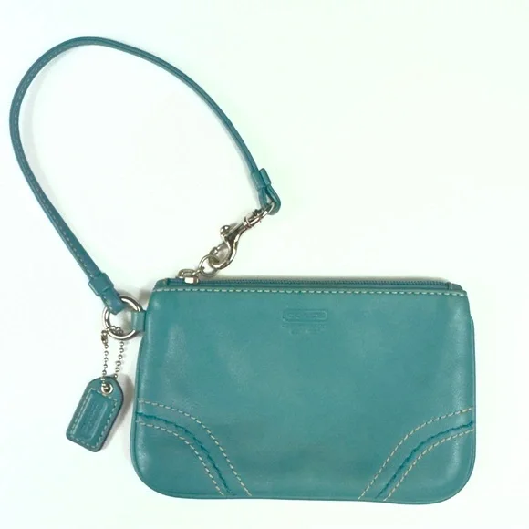 Coach turquoise leather wristlet w orig Coach hangtag, trigger snap closure