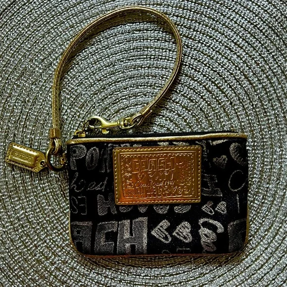 Coach Poppy Black and Gold Wristlet