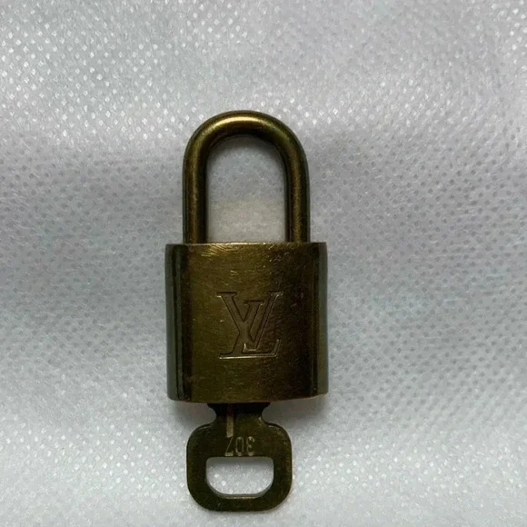 LOUIS VUITTON Lock & Key.  Key no: 307