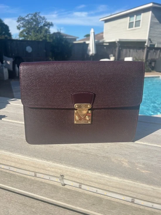 Louis Vuitton Taiga Kourad Clutch