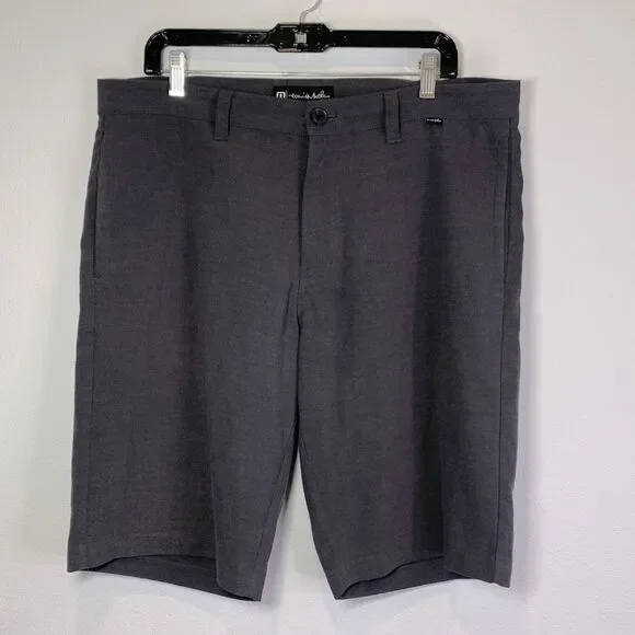 Travis Matthew shorts with flat front zip fly pockets—gray, designed for men.