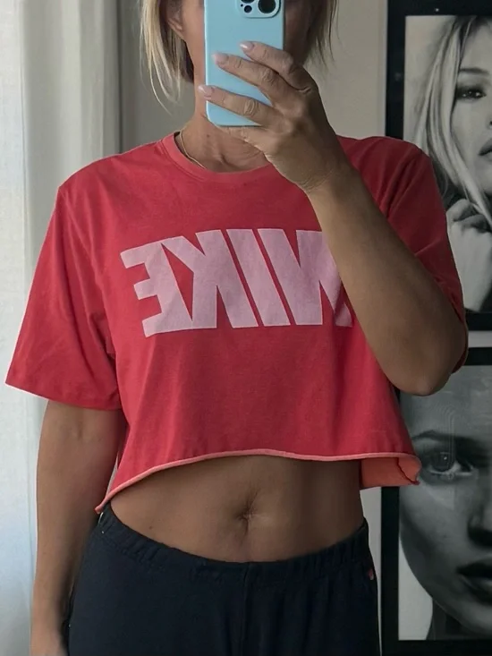 Nike Women’s Coral Red Cropped Logo Tee