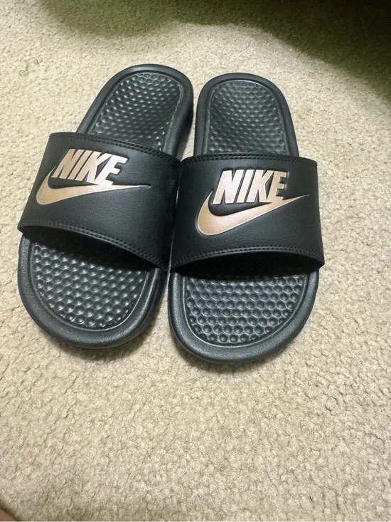 Nike Black Slides with Rose-Gold Logo