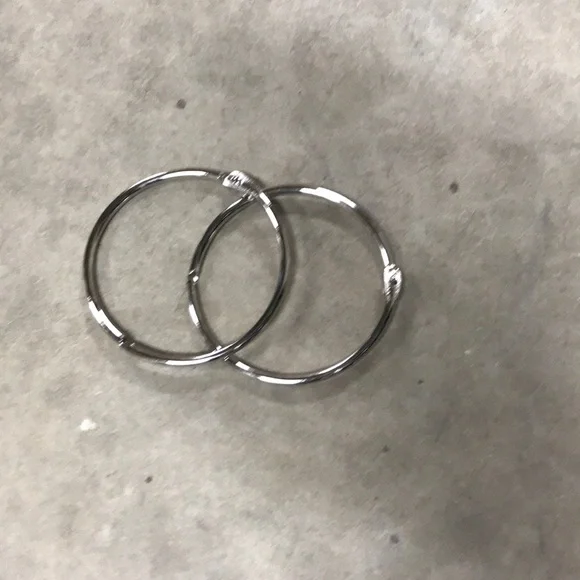 Clips for belts or scarves to hang on rods.