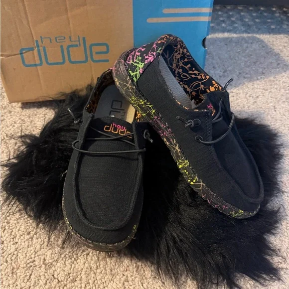 Hey Dude Black Canvas Slip-Ons with Neon Splatter Accents