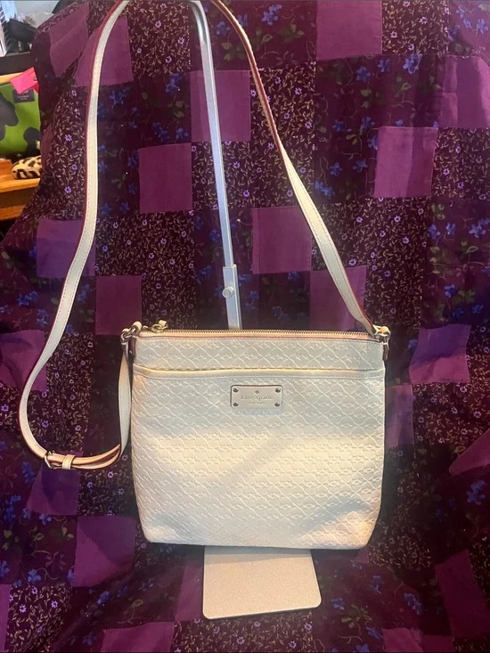 kate spade New York Crossbody Bag in stone with a lavender interior